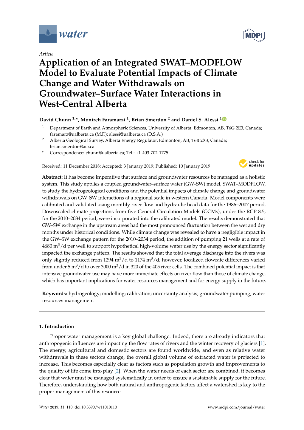 Application of an Integrated SWAT–MODFLOW Model to Evaluate Potential Impacts of Climate Change and Water Withdrawals on Groun