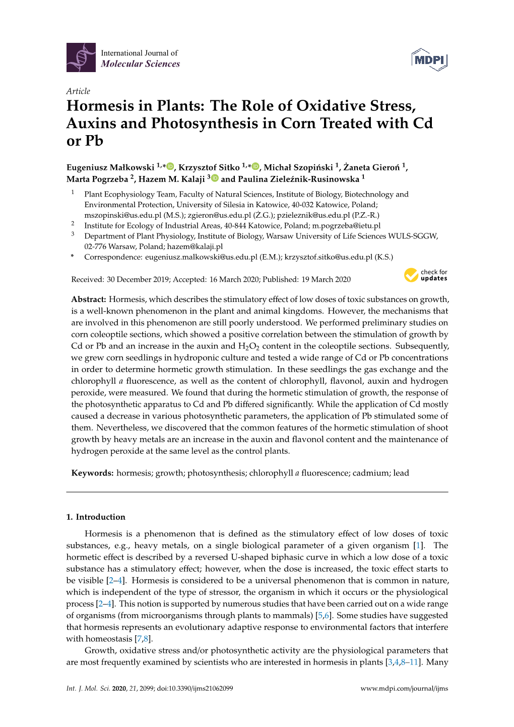 Hormesis in Plants: the Role of Oxidative Stress, Auxins and Photosynthesis in Corn Treated with Cd Or Pb