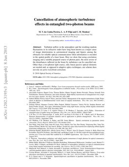 Cancellation of Atmospheric Turbulence Effects in Entangled Two-Photon Beams