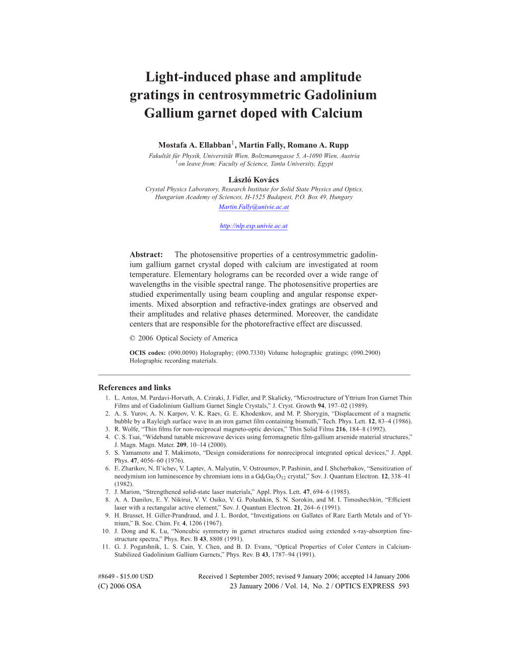 Light-Induced Phase and Amplitude Gratings in Centrosymmetric Gadolinium Gallium Garnet Doped with Calcium