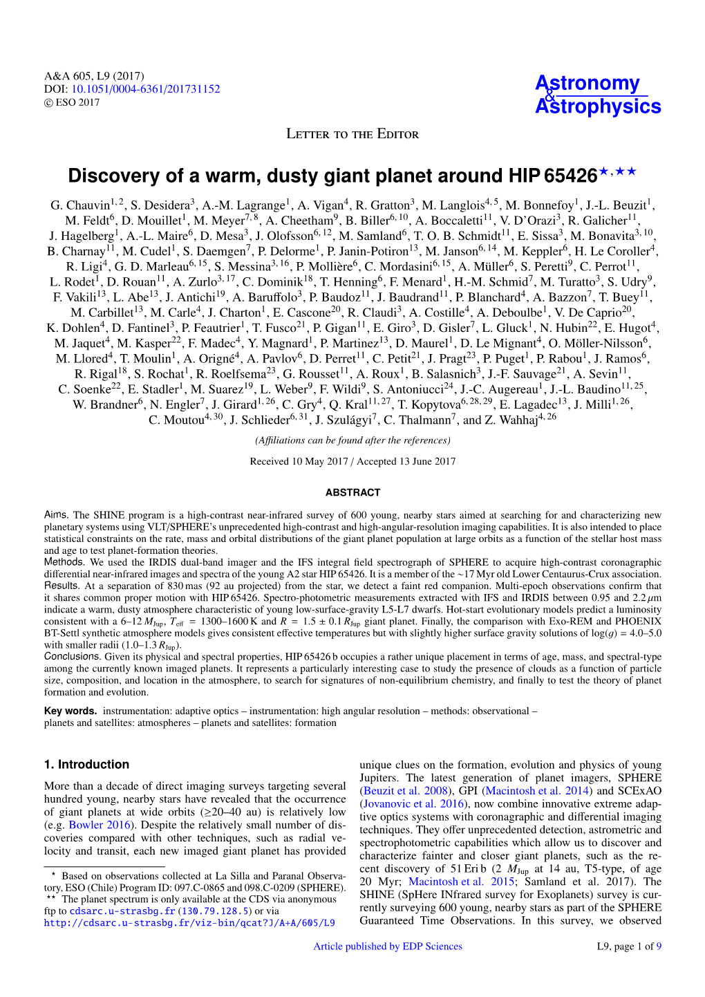 Discovery of a Warm, Dusty Giant Planet Around HIP 65426?,?? G