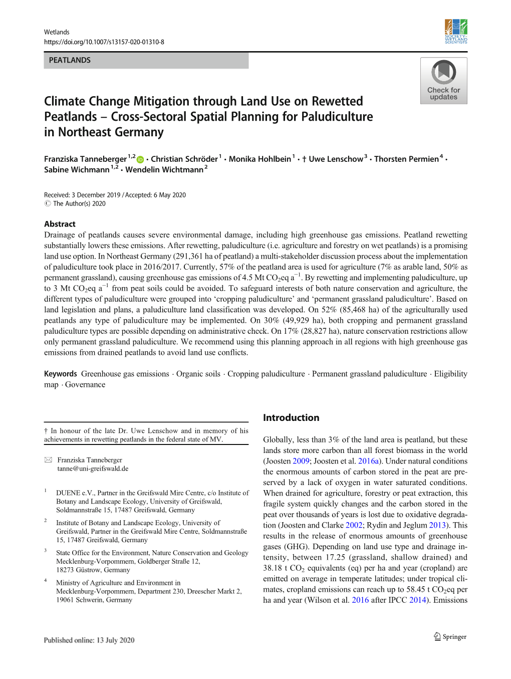 Climate Change Mitigation Through Land Use on Rewetted Peatlands – Cross-Sectoral Spatial Planning for Paludiculture in Northeast Germany