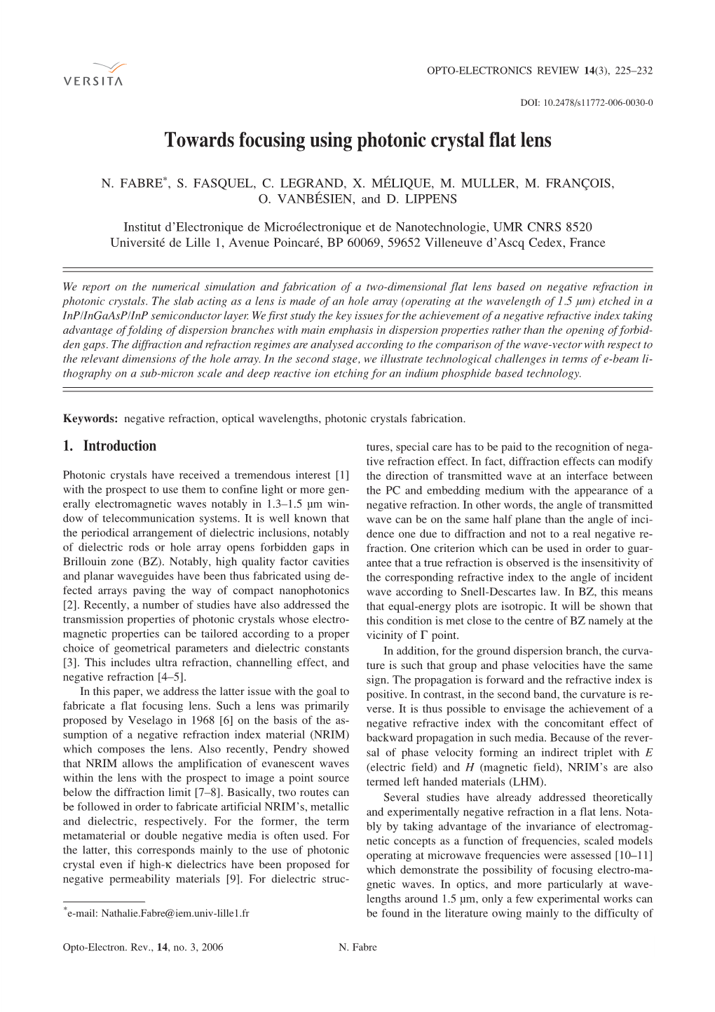 Towards Focusing Using Photonic Crystal Flat Lens