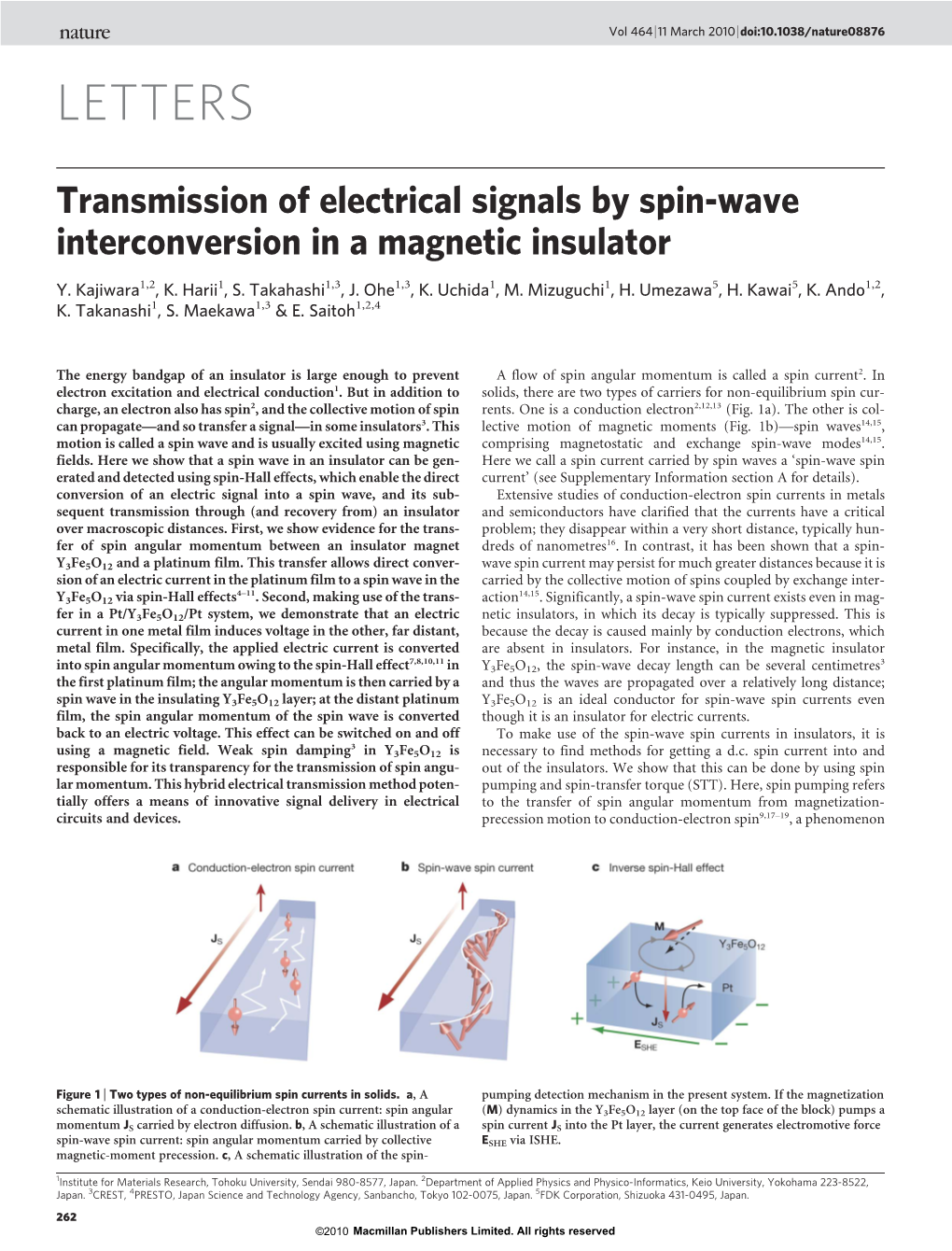 Transmission of Electrical Signals by Spin-Wave Interconversion in a Magnetic Insulator
