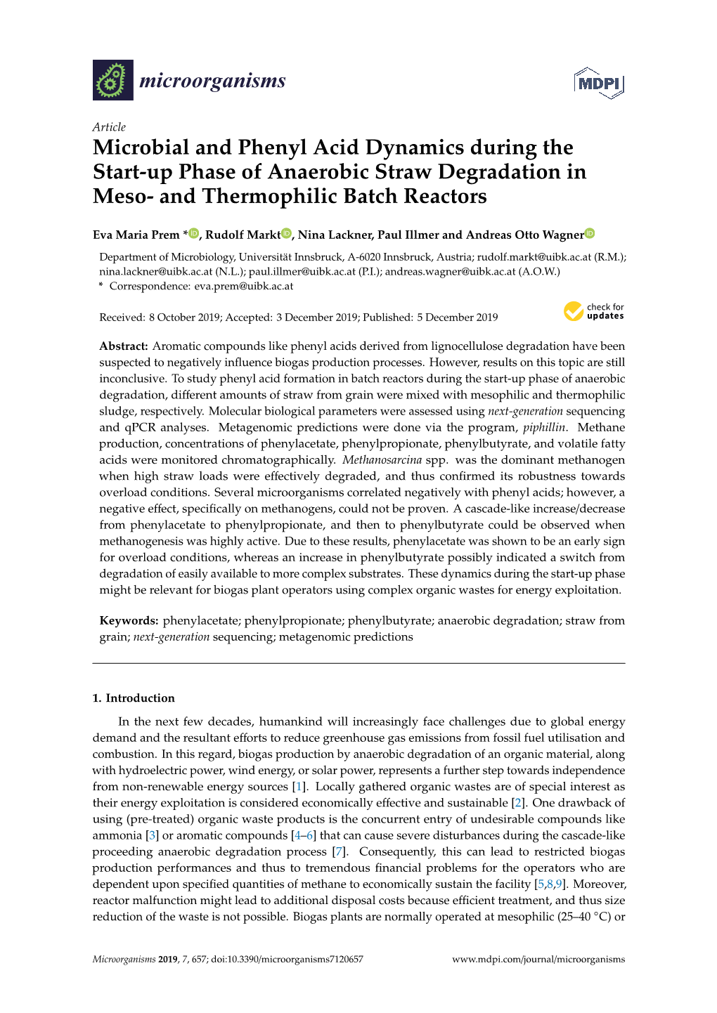 Microbial and Phenyl Acid Dynamics During the Start-Up Phase of Anaerobic Straw Degradation in Meso- and Thermophilic Batch Reactors