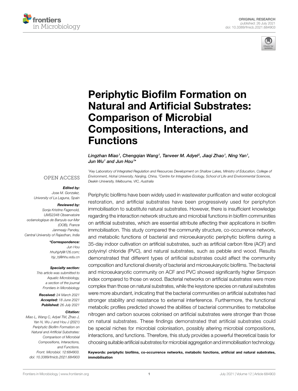 Periphytic Biofilm Formation on Natural and Artificial Substrates: Comparison of Microbial Compositions, Interactions, and Functions