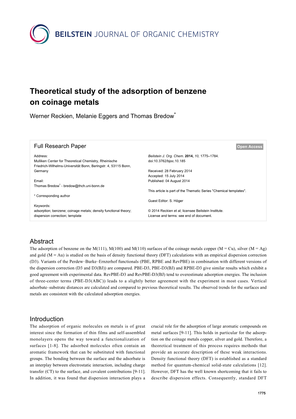 Theoretical Study of the Adsorption of Benzene on Coinage Metals