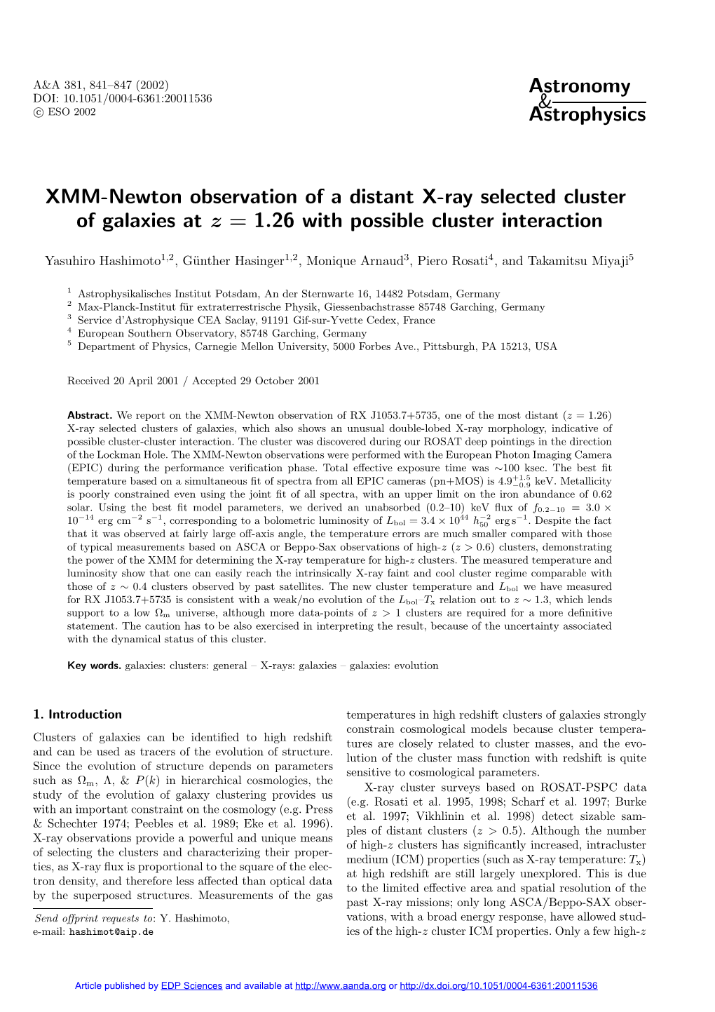 XMM-Newton Observation of a Distant X-Ray Selected Cluster of Galaxies at Z = 1.26 with Possible Cluster Interaction