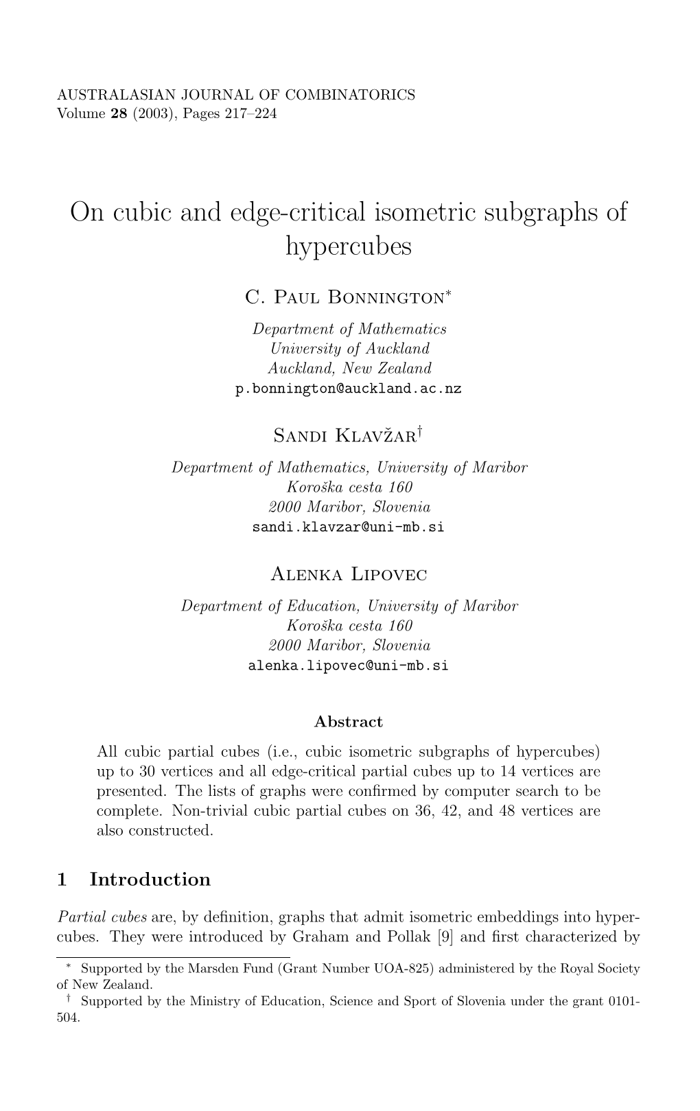 On Cubic and Edge-Critical Isometric Subgraphs of Hypercubes