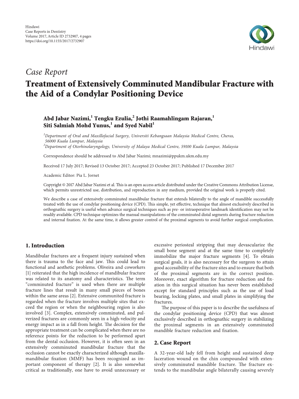 Treatment of Extensively Comminuted Mandibular Fracture with the Aid of a Condylar Positioning Device