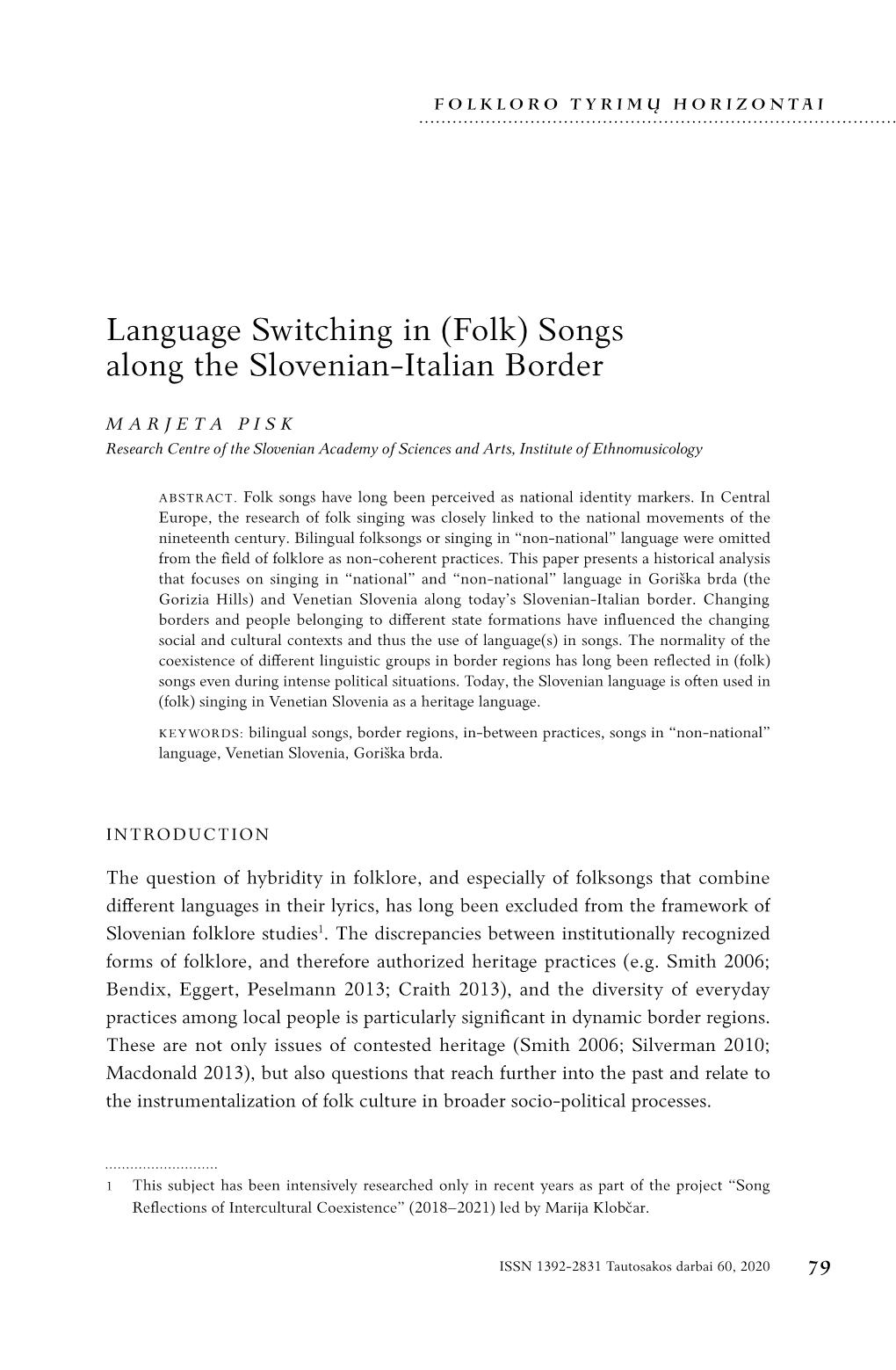 Language Switching in (Folk) Songs Along the Slovenian-Italian Border