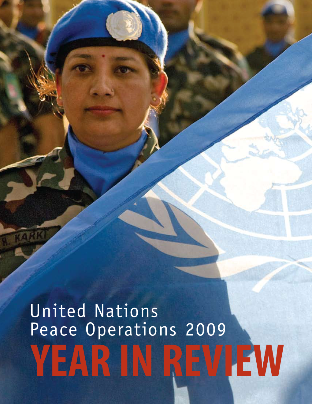 United Nations Peace Operations 2009 YEAR in REVIEW a Military Officer of the United Nations Stabilization Mission in Haiti (MINUSTAH) Gives Food to Children