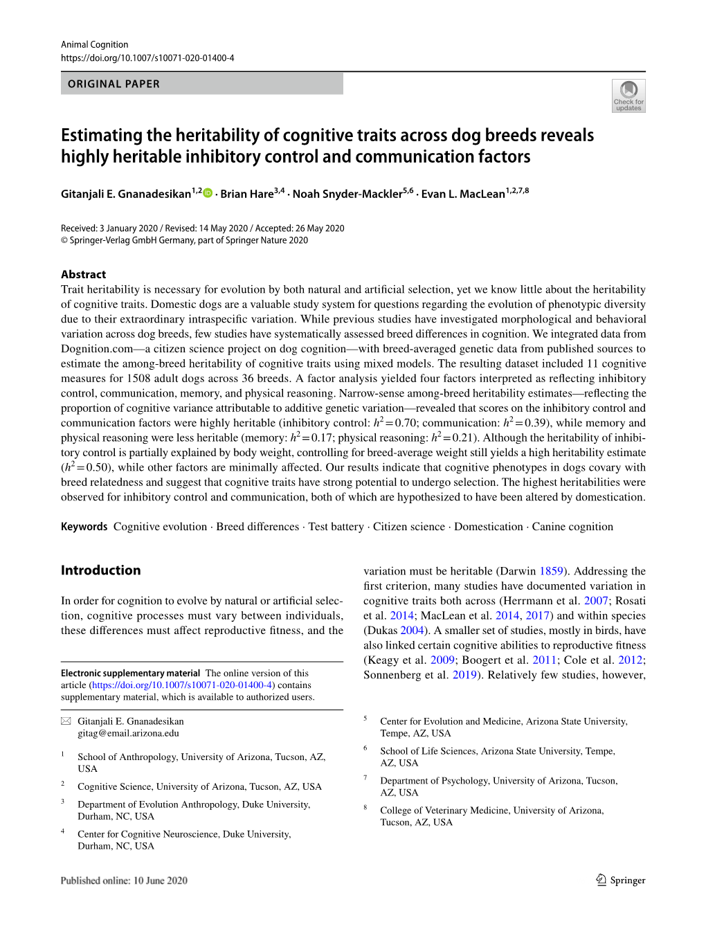 Estimating the Heritability of Cognitive Traits Across Dog Breeds Reveals Highly Heritable Inhibitory Control and Communication Factors