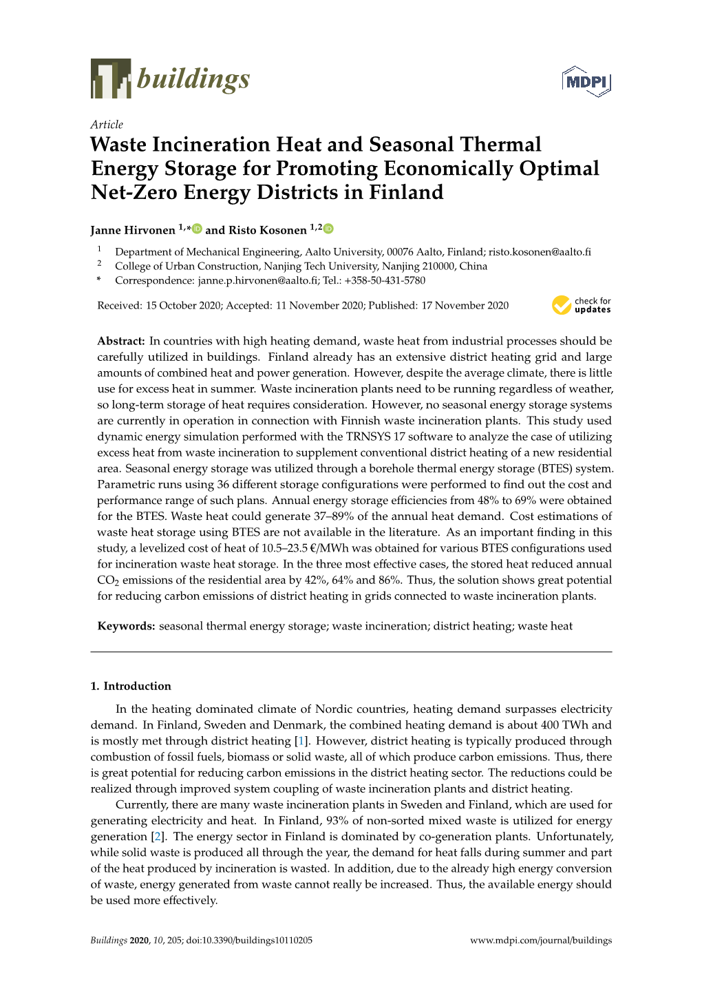 Waste Incineration Heat and Seasonal Thermal Energy Storage for Promoting Economically Optimal Net-Zero Energy Districts in Finland