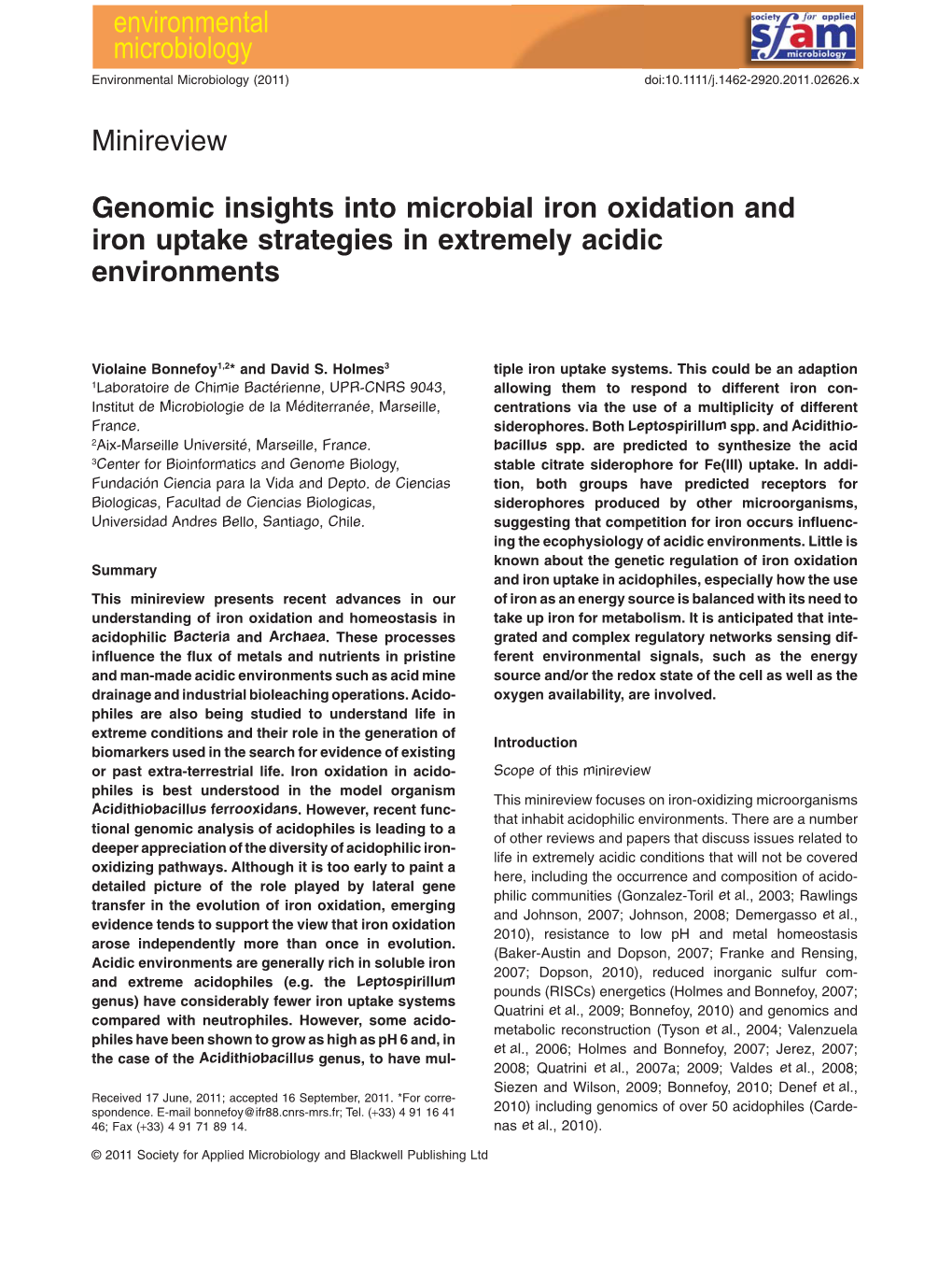 Genomic Insights Into Microbial Iron Oxidation and Iron Uptake Strategies in Extremely Acidic Environments