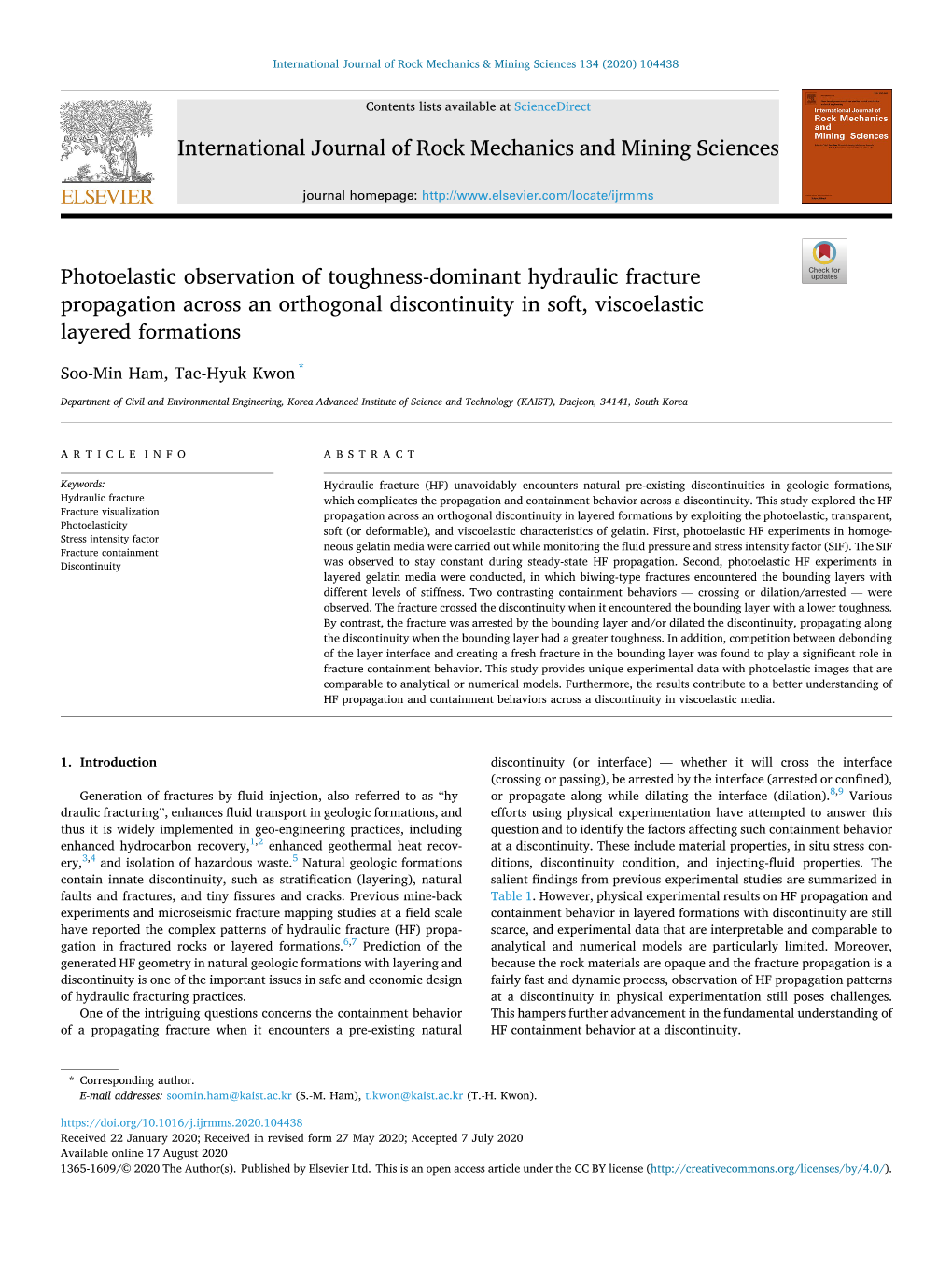 Photoelastic Observation of Toughness-Dominant Hydraulic Fracture Propagation Across an Orthogonal Discontinuity in Soft, Viscoelastic Layered Formations