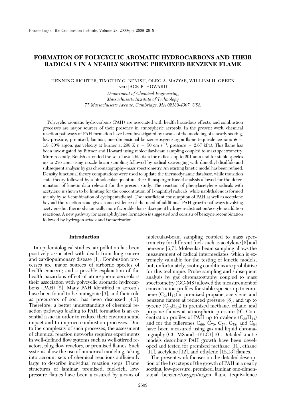 Formation of Polycyclic Aromatic Hydrocarbons and Their Radicals in a Nearly Sooting Premixed Benzene Flame