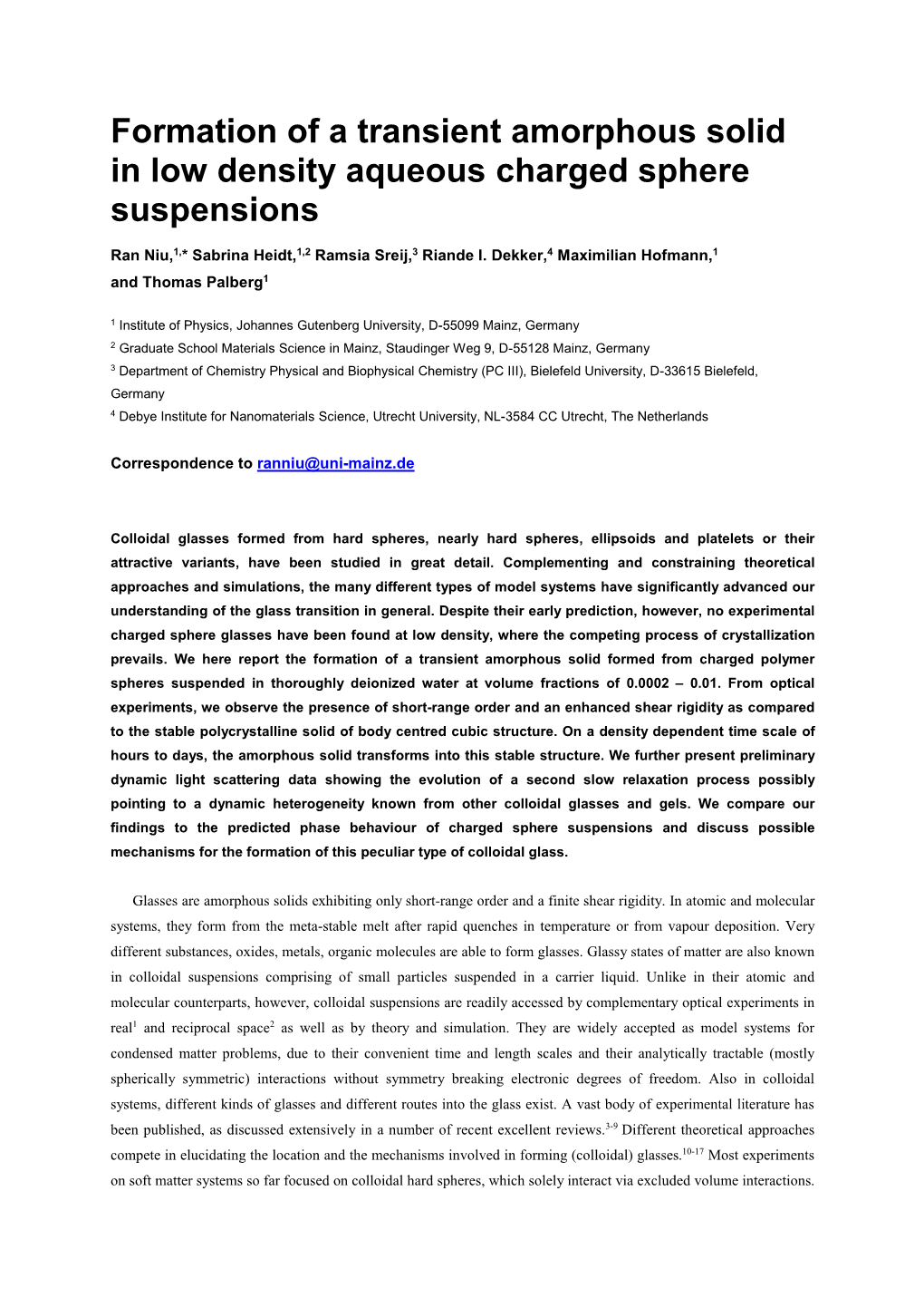 Observation of a Transient Amorphous Solid Formed from Low Density Aqueous Charged Sphere Suspensions