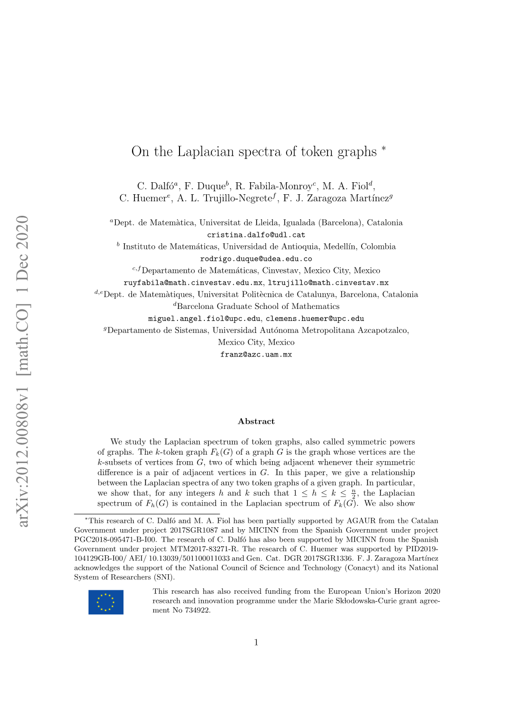 On the Laplacian Spectra of Token Graphs ∗