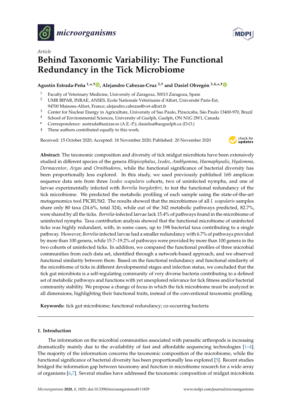 Behind Taxonomic Variability: the Functional Redundancy in the Tick Microbiome
