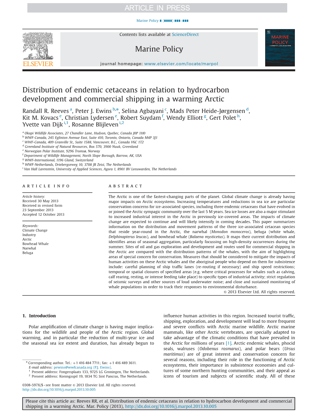 Distribution of Endemic Cetaceans in Relation to Hydrocarbon Development and Commercial Shipping in a Warming Arctic