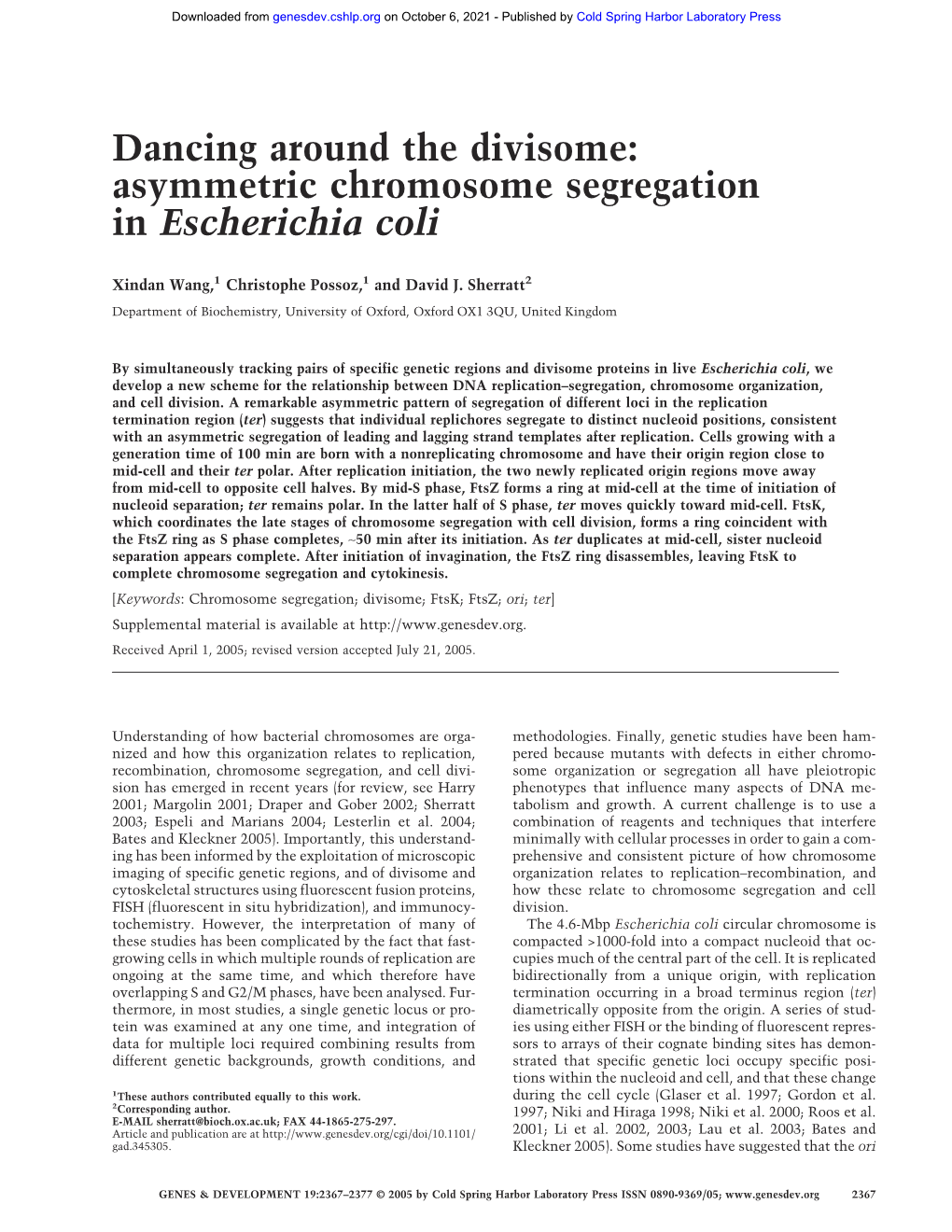 Dancing Around the Divisome: Asymmetric Chromosome Segregation in Escherichia Coli