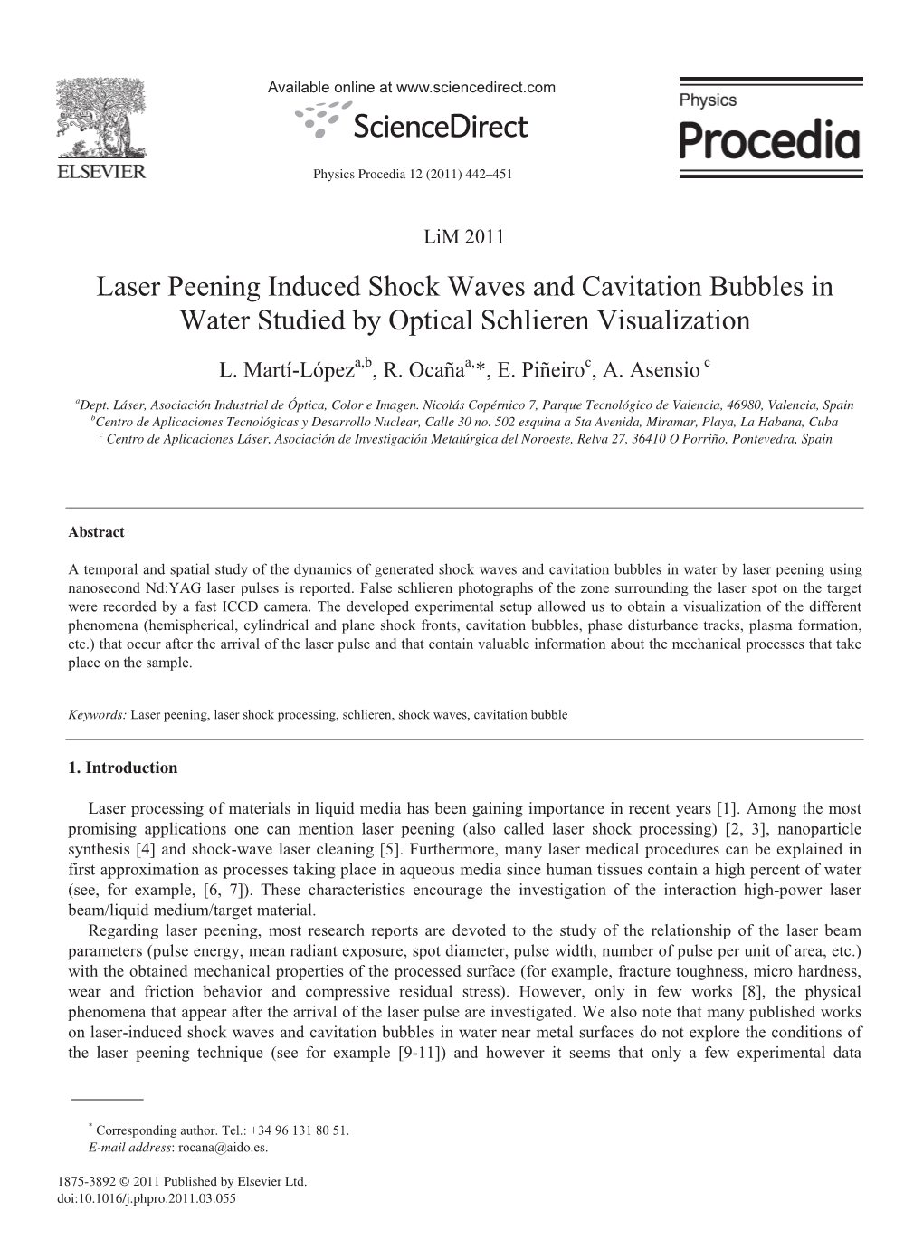 Laser Peening Induced Shock Waves and Cavitation Bubbles in Water Studied by Optical Schlieren Visualization