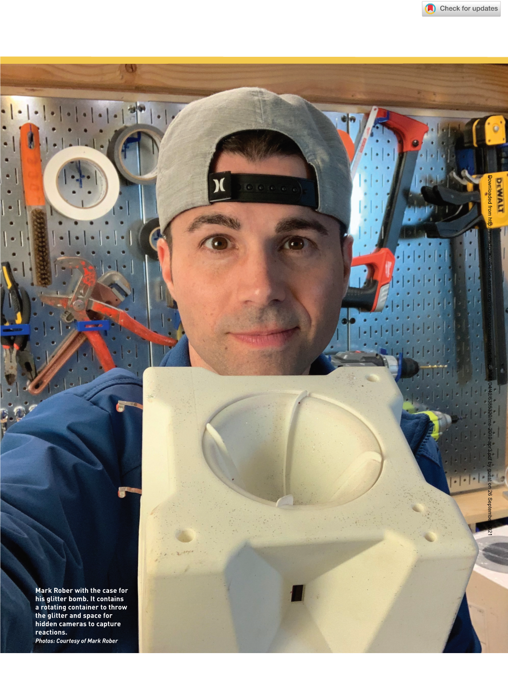 Mark Rober with the Case for His Glitter Bomb. It Contains a Rotating Container to Throw the Glitter and Space for Hidden Cameras to Capture Reactions