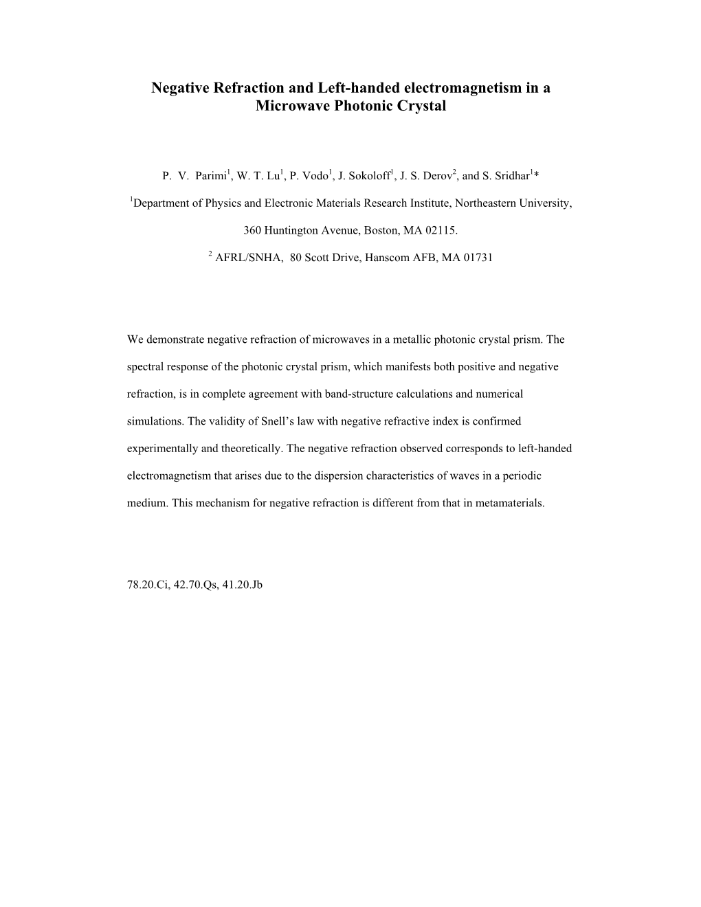 Negative Refraction and Left-Handed Electromagnetism in a Microwave Photonic Crystal