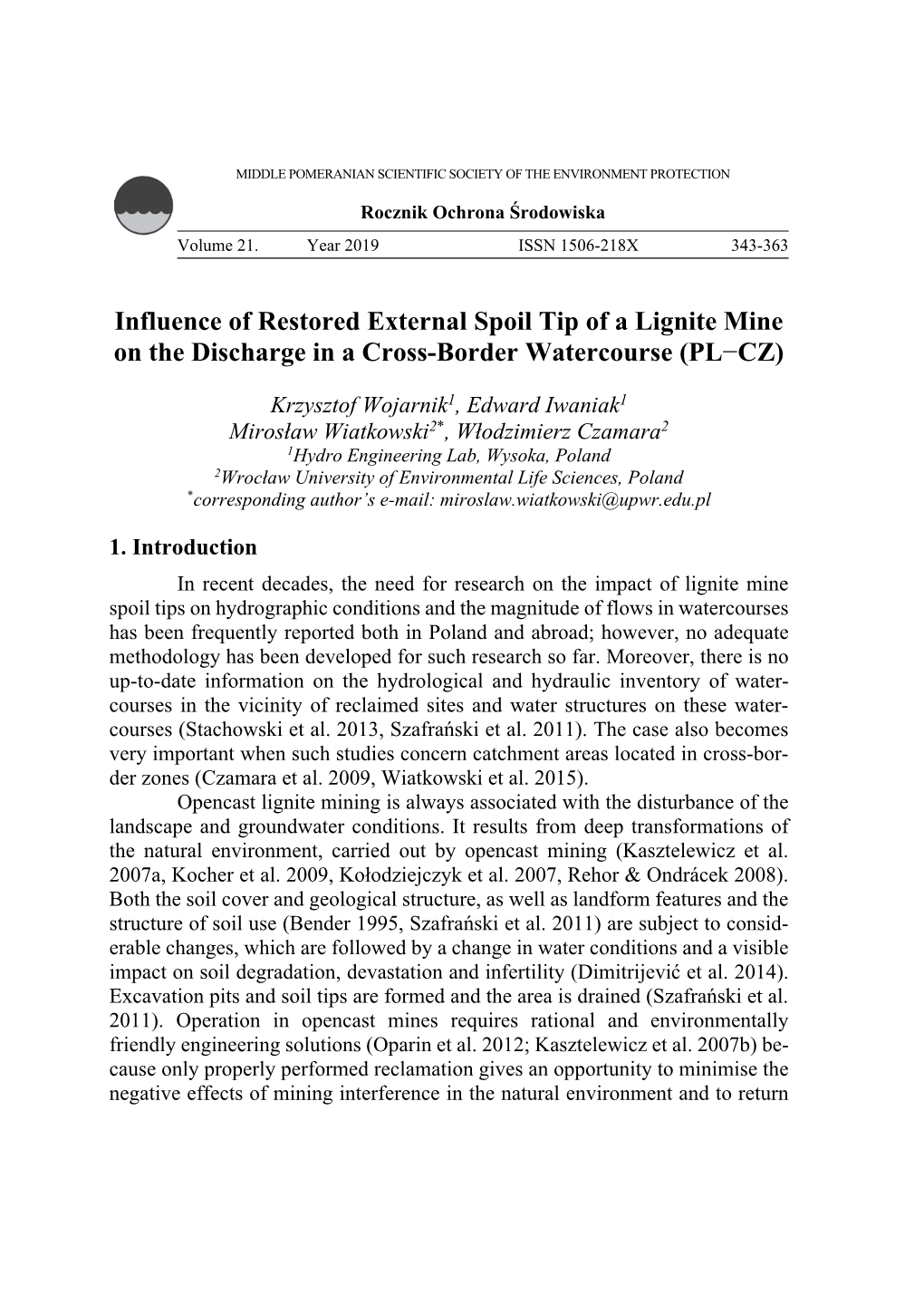 Influence of Restored External Spoil Tip of a Lignite Mine on the Discharge in a Cross-Border Watercourse (PL−CZ)