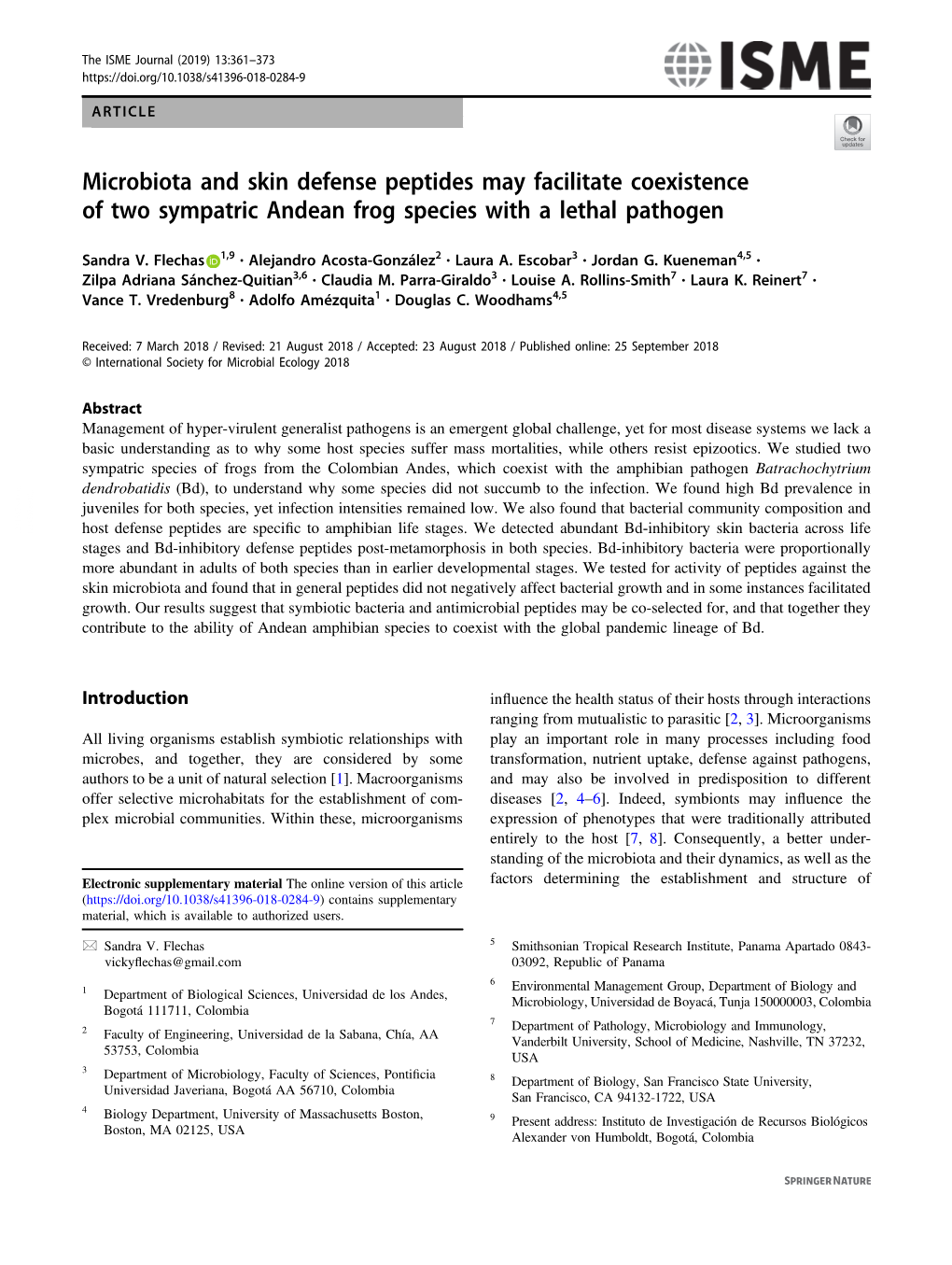 Microbiota and Skin Defense Peptides May Facilitate Coexistence of Two Sympatric Andean Frog Species with a Lethal Pathogen