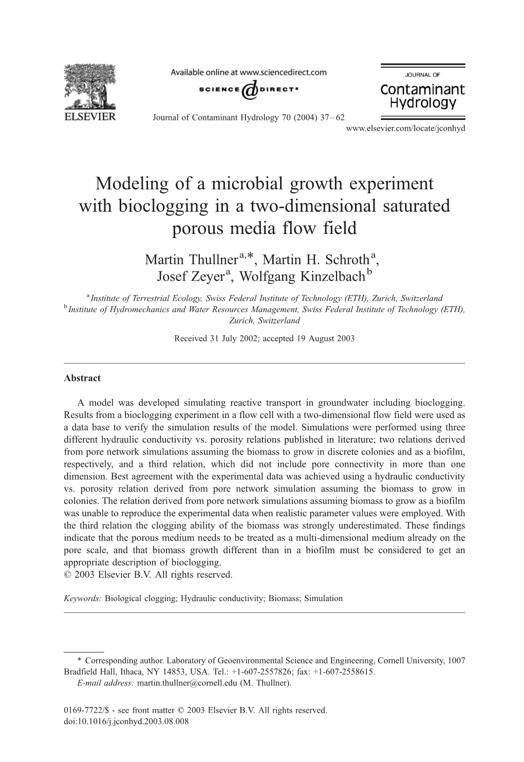 Modeling of a Microbial Growth Experiment with Bioclogging in a Two-Dimensional Saturated Porous Media Flow Field
