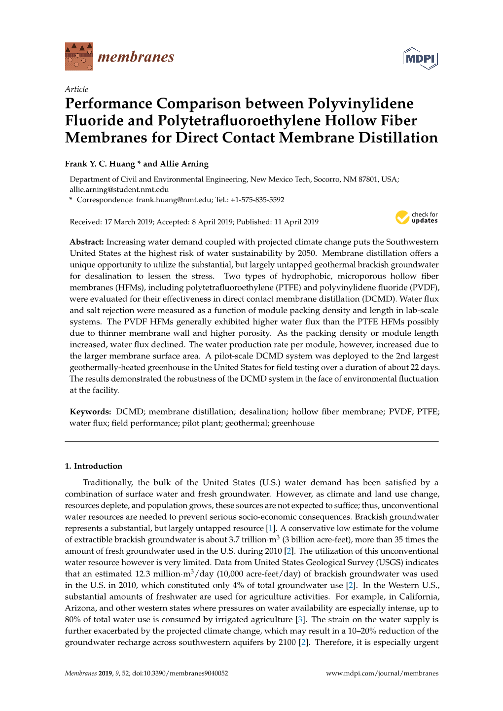 Performance Comparison Between Polyvinylidene Fluoride and Polytetraﬂuoroethylene Hollow Fiber Membranes for Direct Contact Membrane Distillation