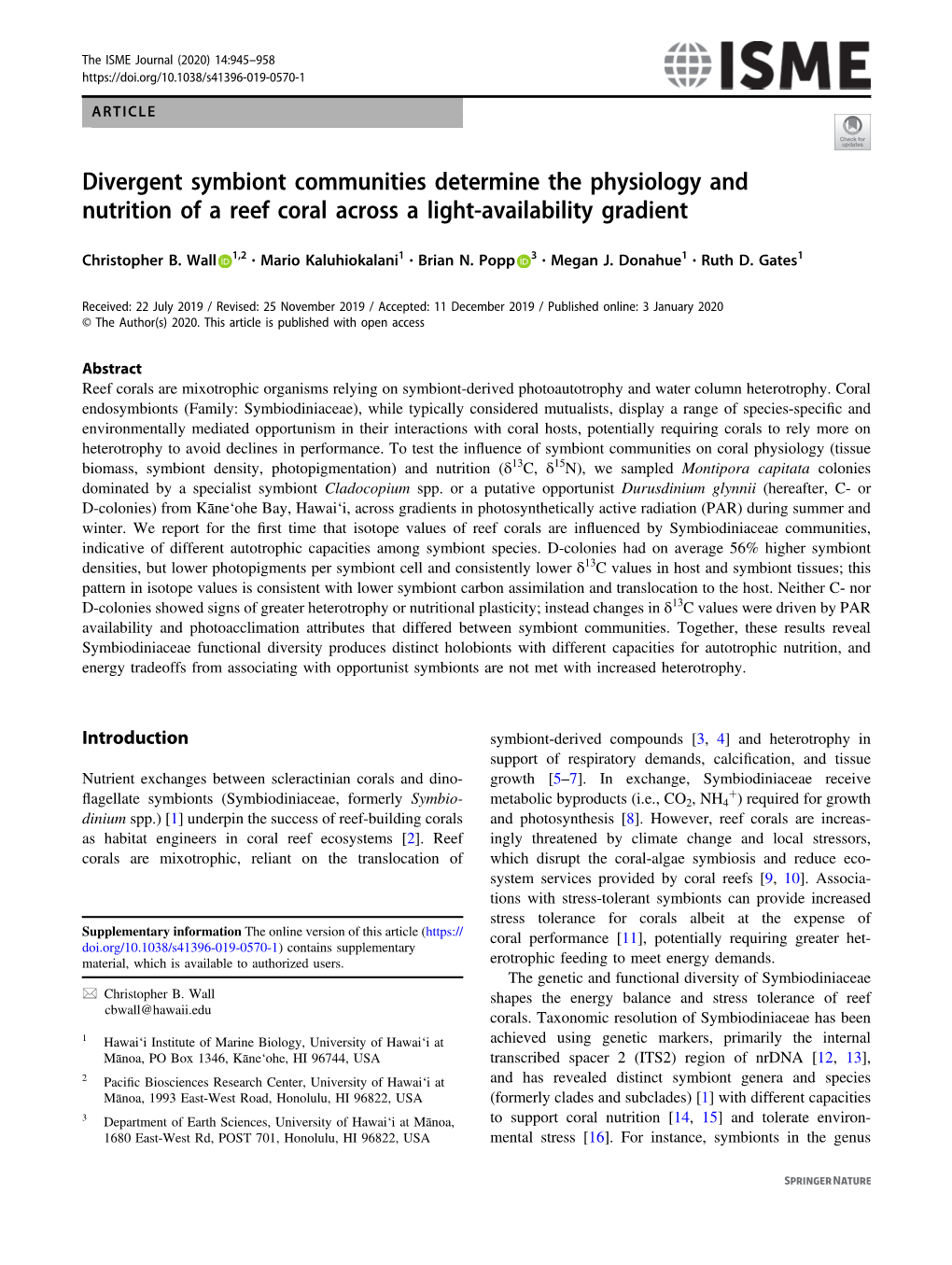 Divergent Symbiont Communities Determine the Physiology and Nutrition of a Reef Coral Across a Light-Availability Gradient