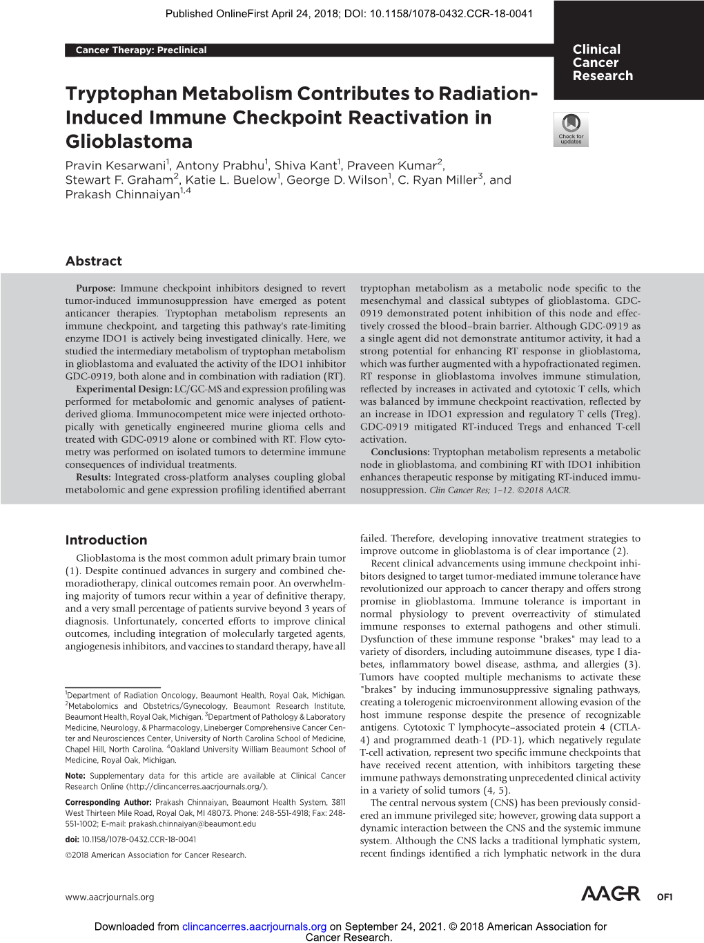 Tryptophan Metabolism Contributes to Radiation-Induced Immune Checkpoint Reactivation in Glioblastoma