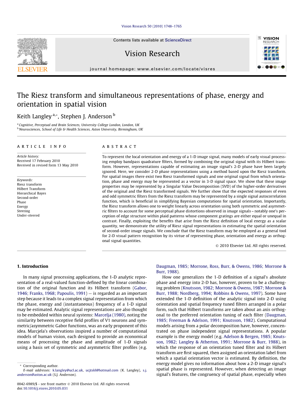 The Riesz Transform and Simultaneous Representations of Phase, Energy and Orientation in Spatial Vision