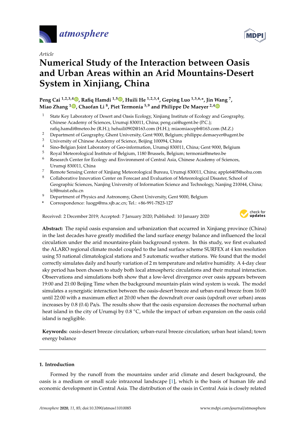 Numerical Study of the Interaction Between Oasis and Urban Areas Within an Arid Mountains-Desert System in Xinjiang, China