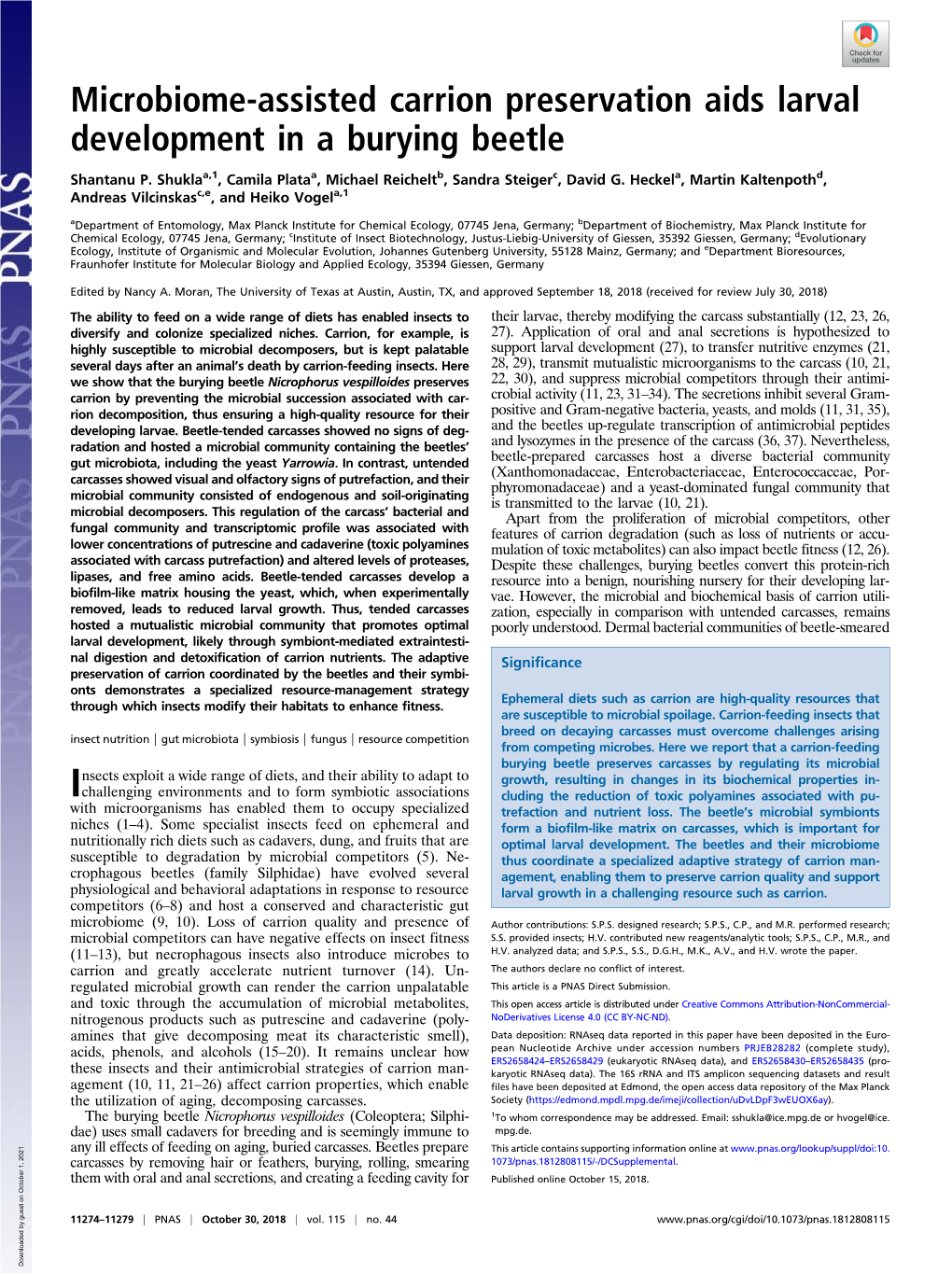 Microbiome-Assisted Carrion Preservation Aids Larval Development in a Burying Beetle