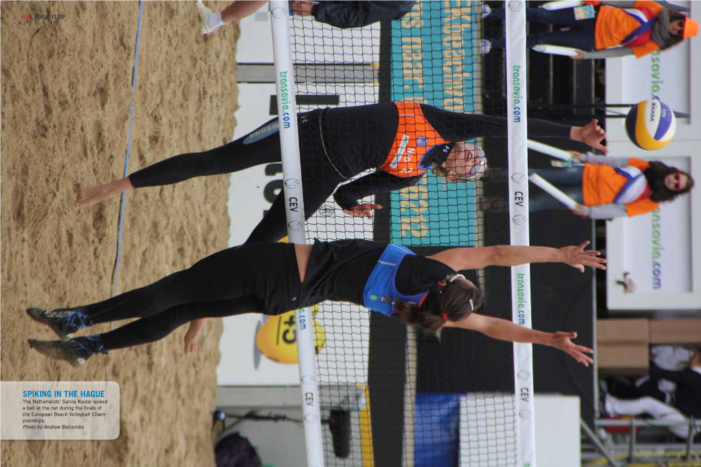 SPIKING in the HAGUE the Netherlands’ Sanne Keizer Spiked a Ball at the Net During the ﬁnals of the European Beach Volleyball Cham- Pionships