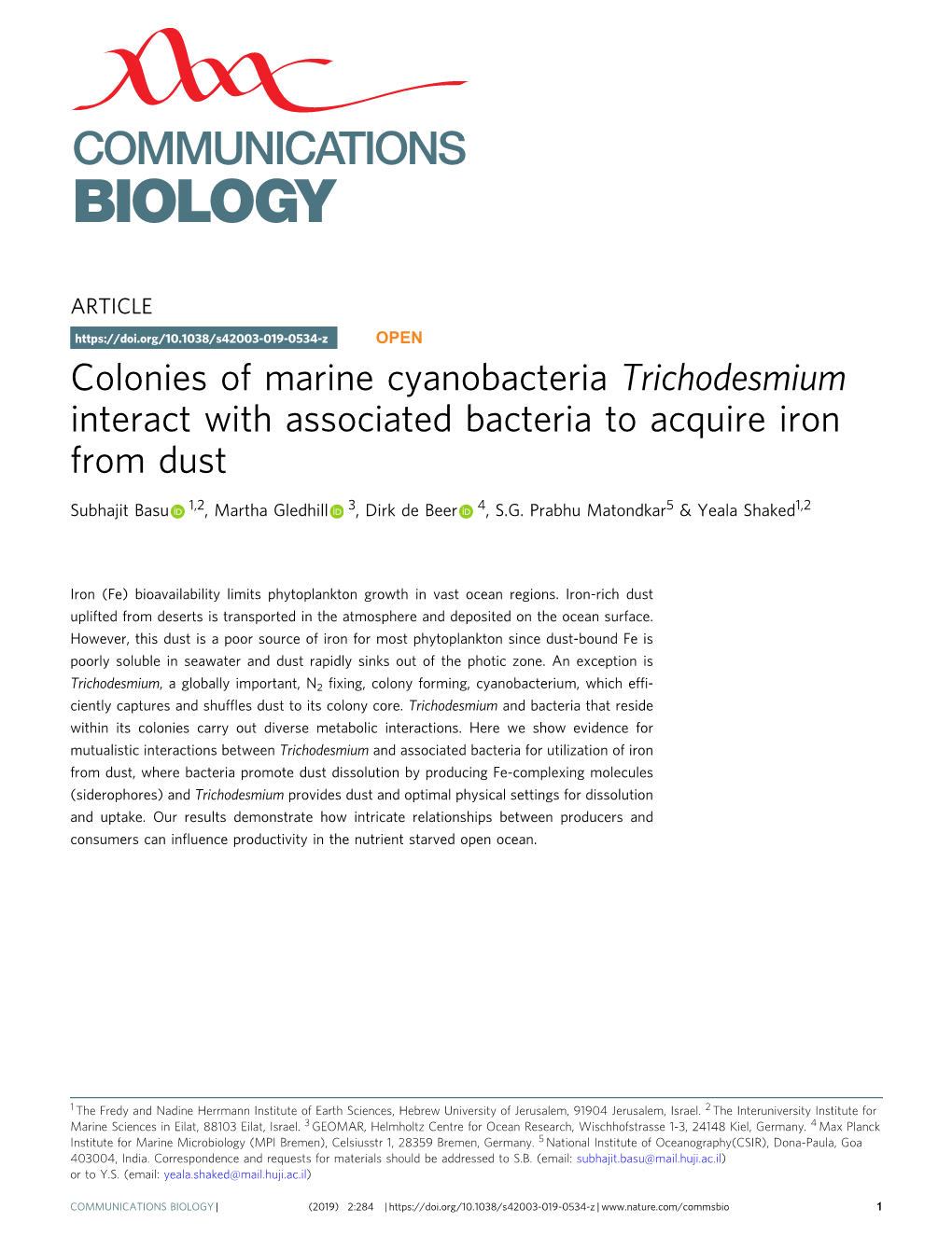 Colonies of Marine Cyanobacteria Trichodesmium Interact with Associated Bacteria to Acquire Iron from Dust
