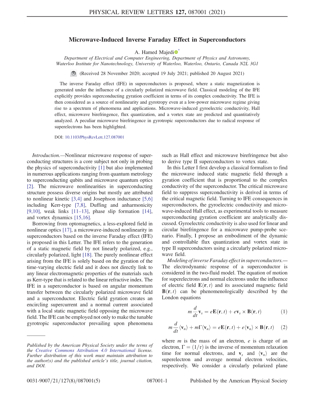 Microwave-Induced Inverse Faraday Effect in Superconductors