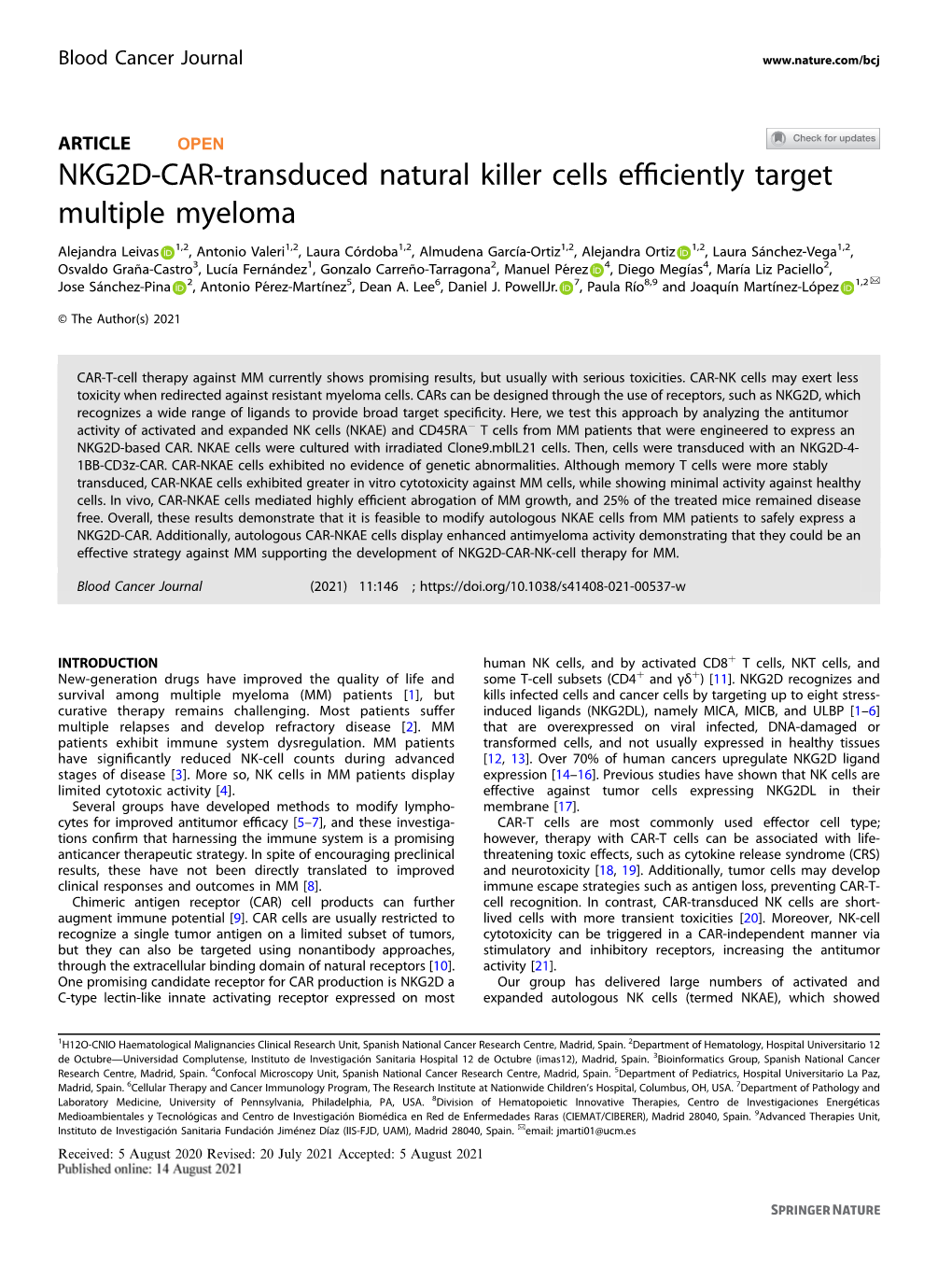 NKG2D-CAR-Transduced Natural Killer Cells Efficiently Target Multiple