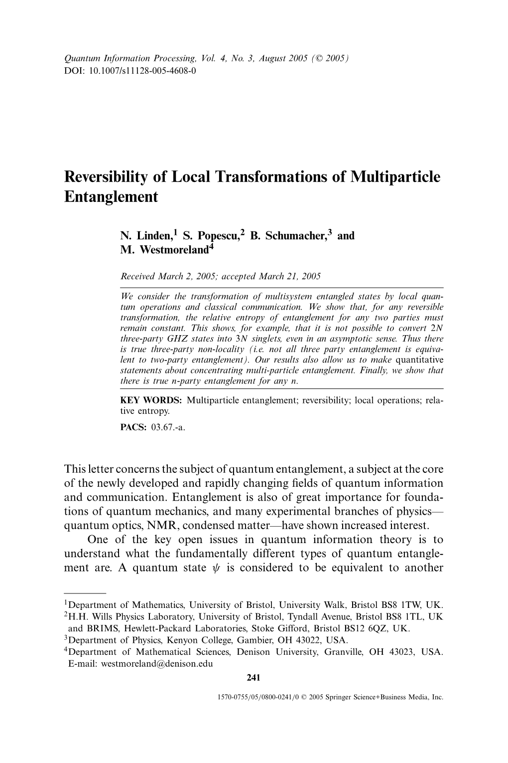 Reversibility of Local Transformations of Multiparticle Entanglement