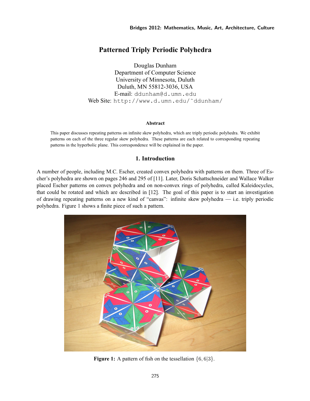 Patterned Triply Periodic Polyhedra