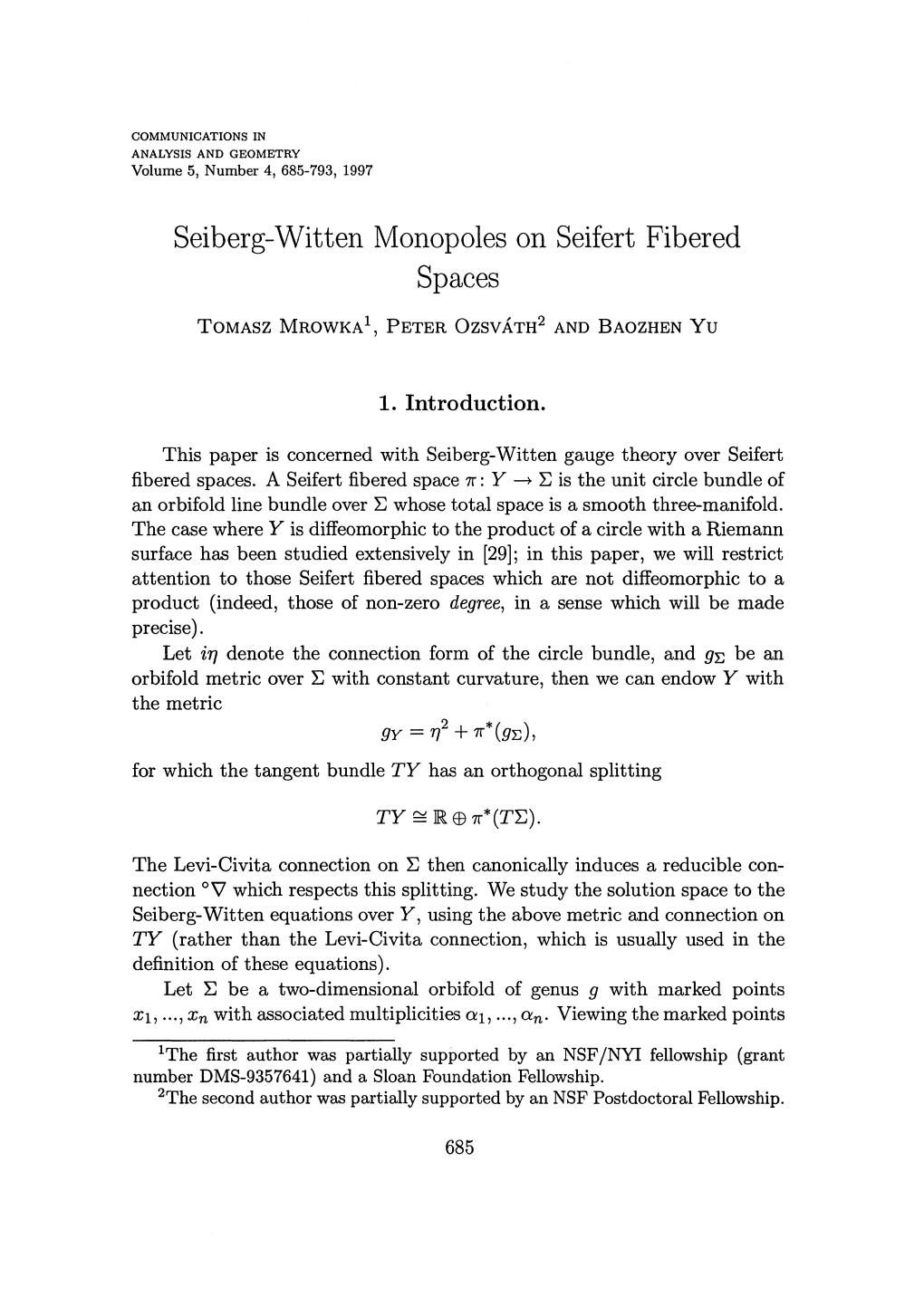 Seiberg-Witten Monopoles on Seifert Fibered Spaces