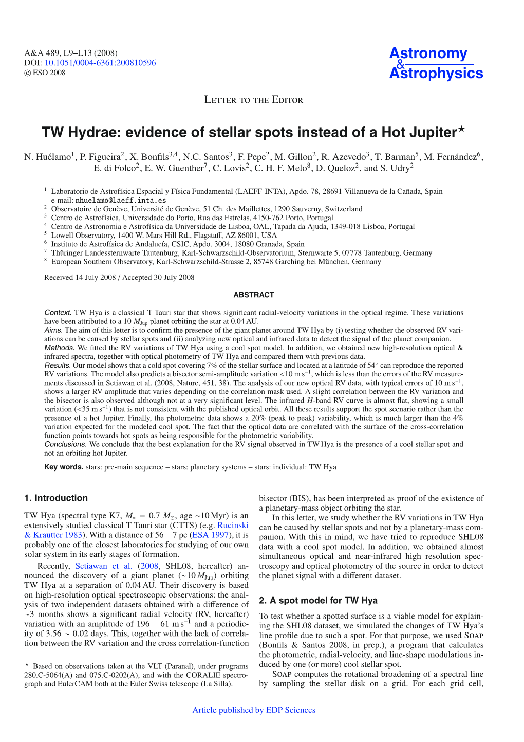 TW Hydrae: Evidence of Stellar Spots Instead of a Hot Jupiter