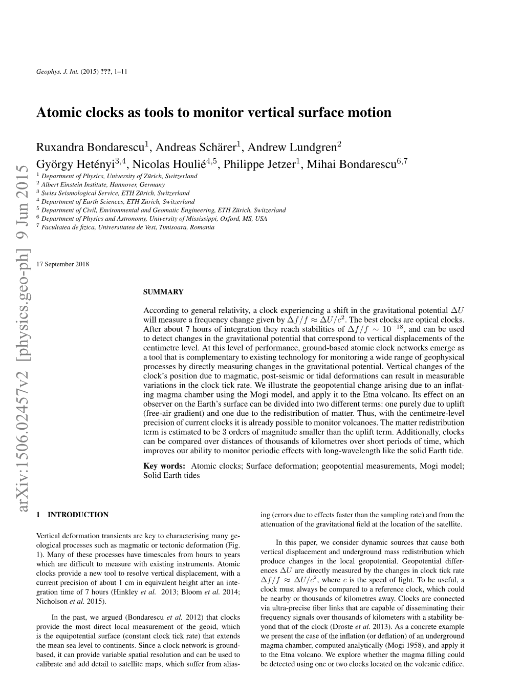 Atomic Clocks As Tools to Monitor Vertical Surface Motion