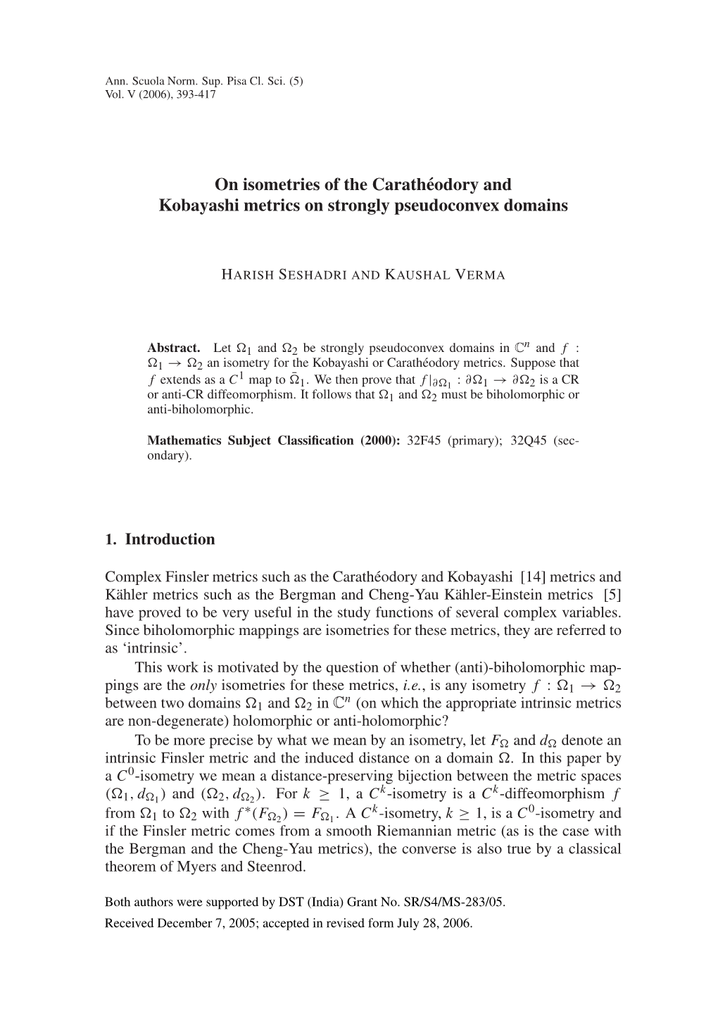 On Isometries of the Carathéodory and Kobayashi Metrics on Strongly Pseudoconvex Domains