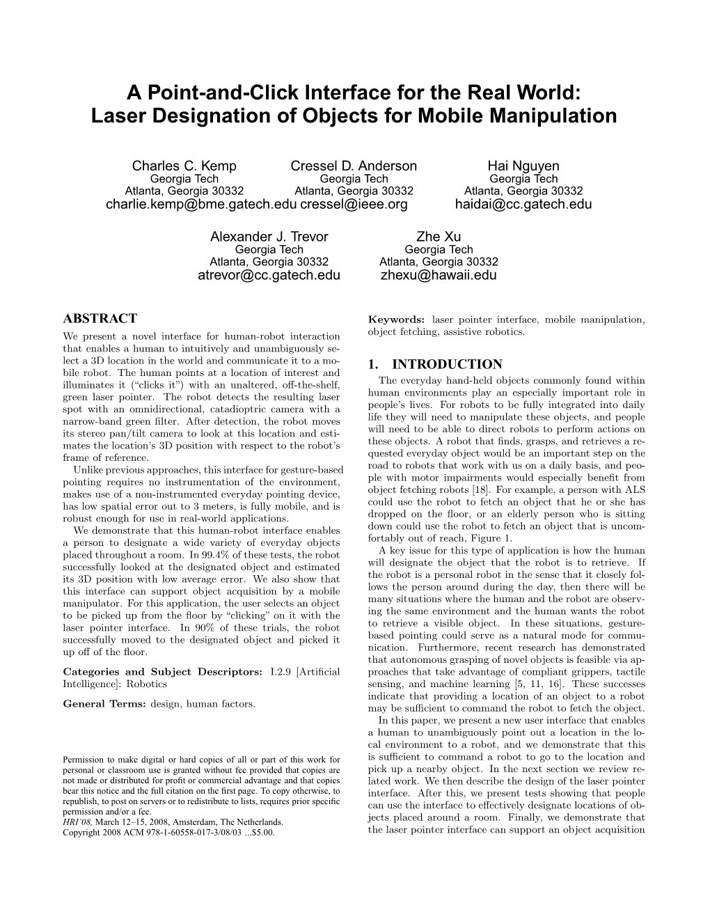 A Point-And-Click Interface for the Real World: Laser Designation of Objects for Mobile Manipulation