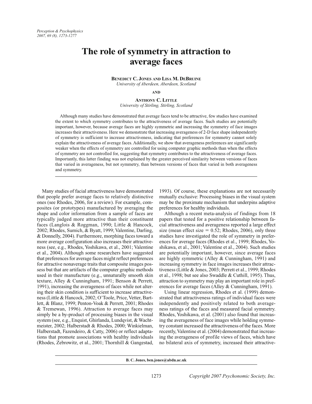 The Role of Symmetry in Attraction to Average Faces
